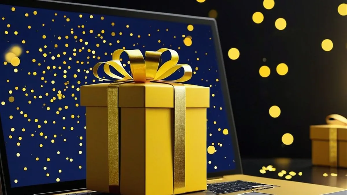Laptop con una caja de regalo amarilla al frente y confeti dorado en la pantalla